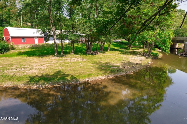 view of yard with a water view