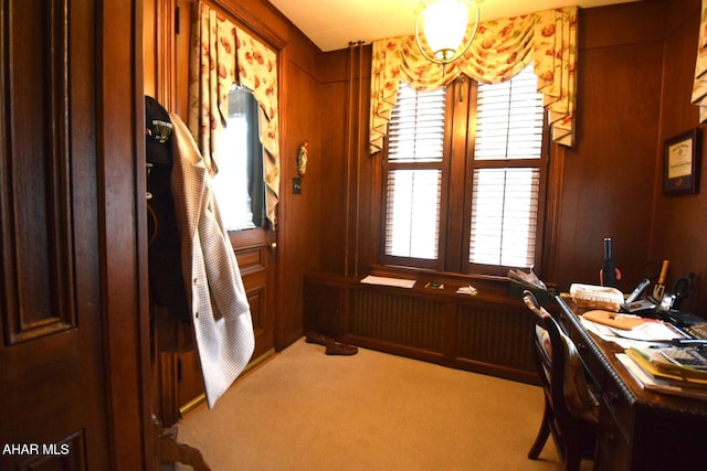 carpeted office with wooden walls