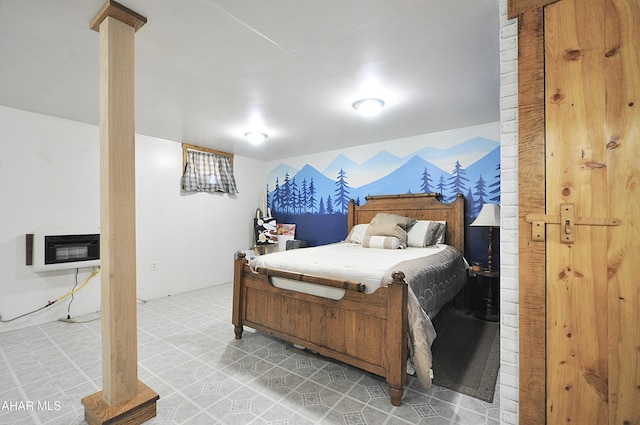 bedroom with tile patterned floors and heating unit