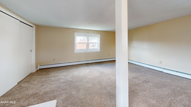 interior space with a baseboard radiator