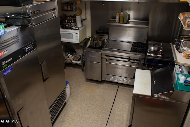 kitchen with stainless steel fridge