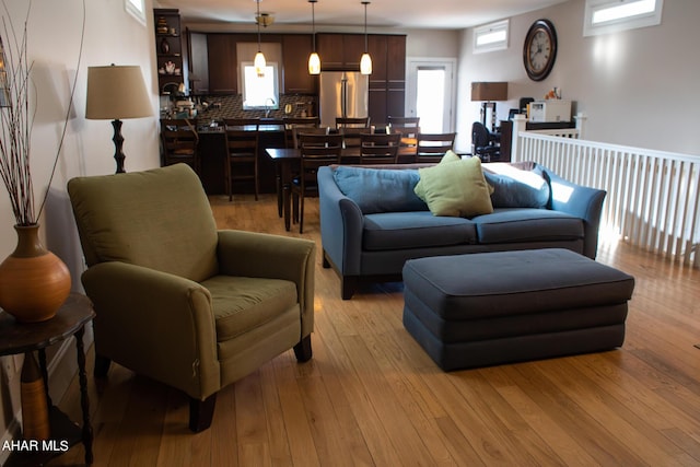 living room featuring light wood-type flooring