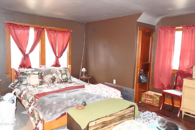 bedroom featuring dark hardwood / wood-style floors