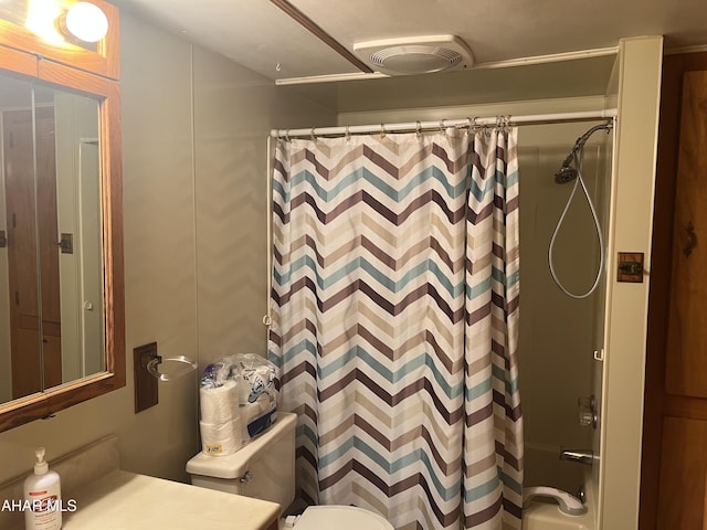 full bathroom featuring shower / bathtub combination with curtain, vanity, and toilet