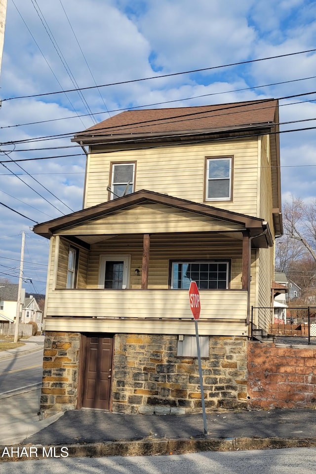 view of front facade with stone siding