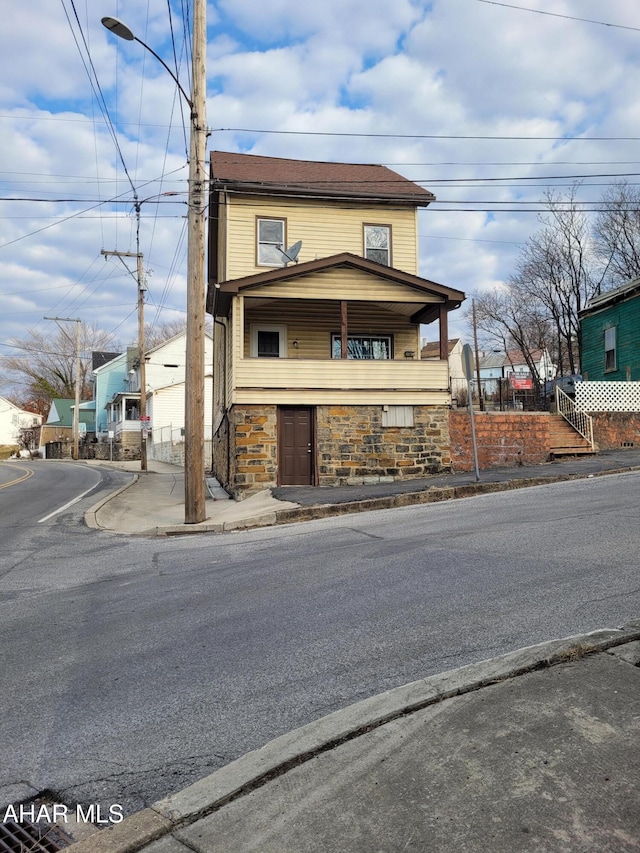 view of front of home with stone siding