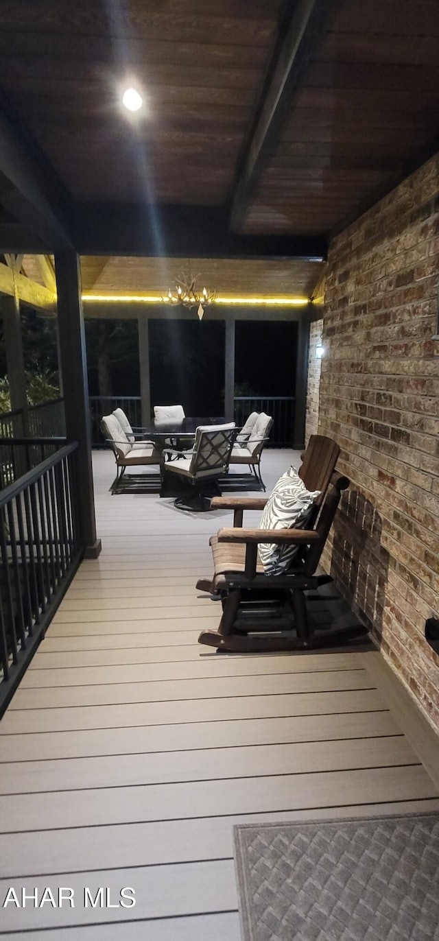 wooden deck featuring outdoor lounge area