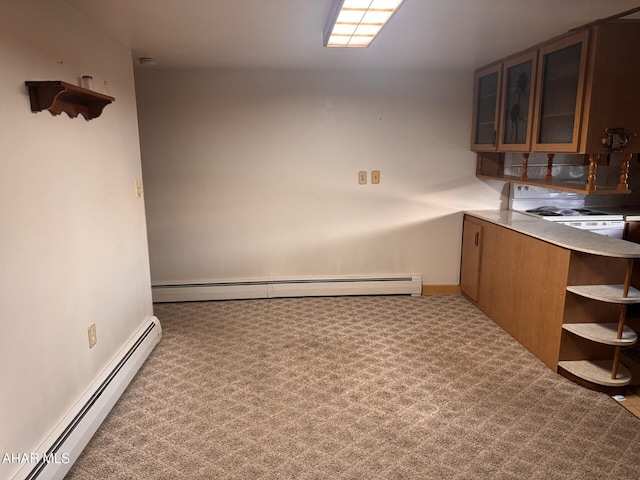 kitchen featuring white range, light colored carpet, and a baseboard heating unit