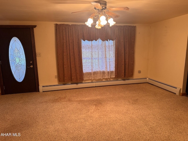 carpeted foyer entrance with ceiling fan