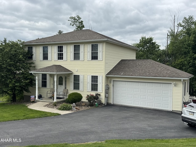 153 Frederick Rd, Altoona, PA 16602 - colonial inspired home featuring driveway, a garage, and a porch