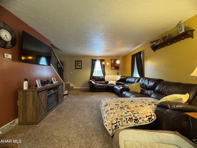 153 Frederick Rd, Altoona, PA 16602 - living area with a textured ceiling, stairs, carpet flooring, and baseboards
