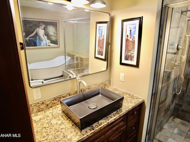 bathroom featuring vanity and walk in shower