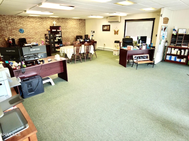 office space with a wall unit AC, carpet floors, brick wall, and a baseboard heating unit