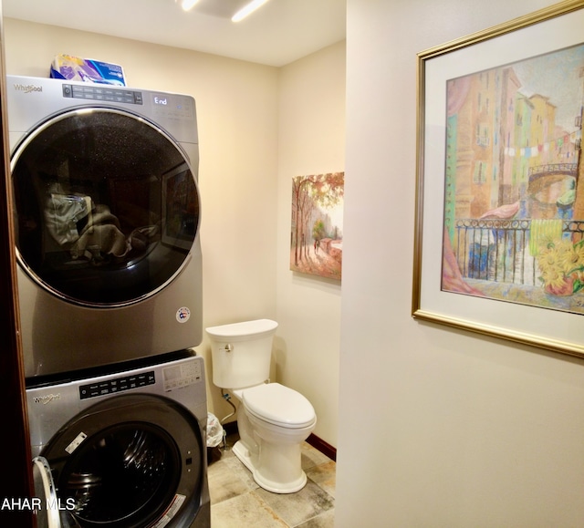 laundry room with stacked washer and clothes dryer