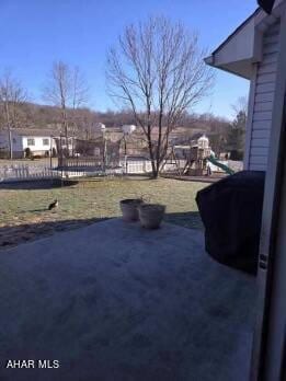 view of yard featuring a playground