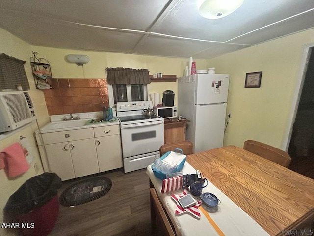 2634 Adams Run Rd, New Paris, PA 15554 - kitchen featuring white appliances, dark wood-style flooring, white cabinets, cooling unit, and light countertops