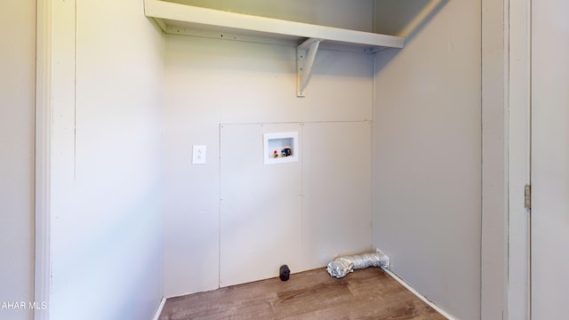 clothes washing area featuring wood-type flooring and hookup for a washing machine