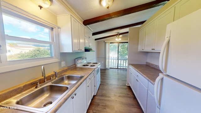 kitchen featuring white cabinetry, sink, vaulted ceiling with beams, dark hardwood / wood-style floors, and white appliances