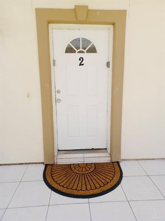 107 E Bahama St, South Padre Island, TX 78597 - entrance to property with stucco siding