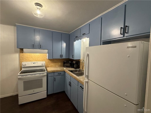 kitchen with backsplash, sink, dark hardwood / wood-style floors, and white appliances