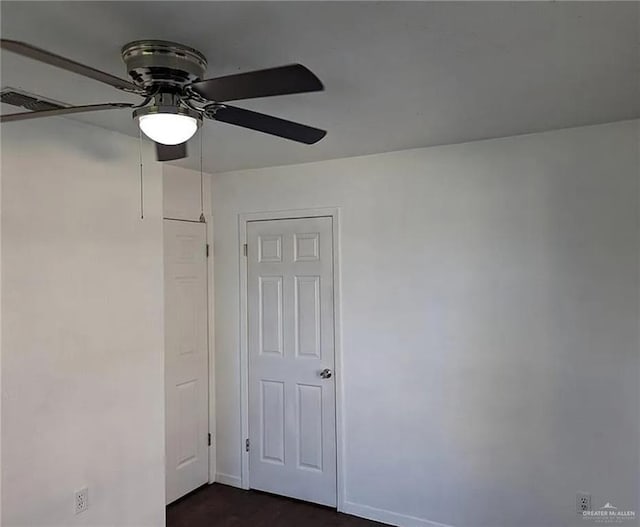 unfurnished room with ceiling fan