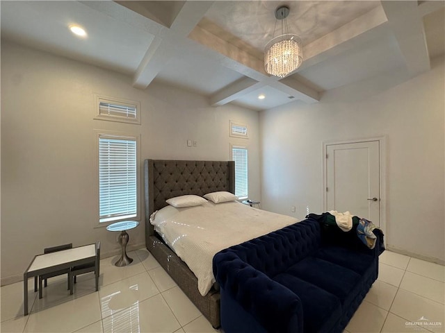 bedroom with beamed ceiling, light tile patterned floors, coffered ceiling, and a notable chandelier