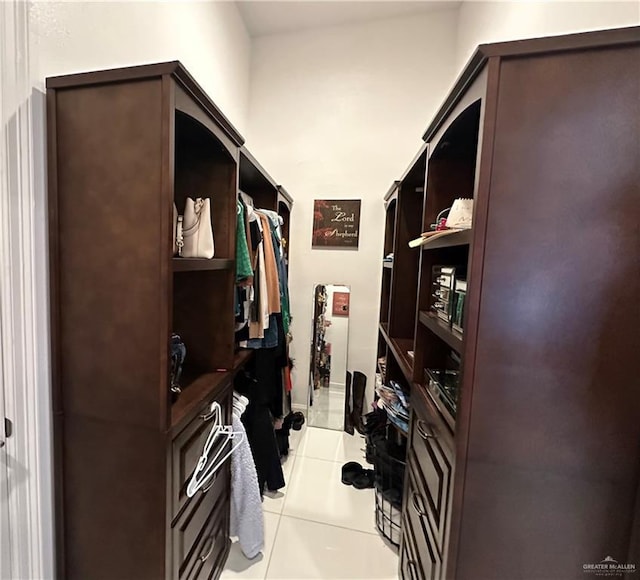 walk in closet featuring light tile patterned floors