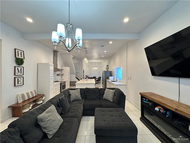 living room featuring beam ceiling, light tile patterned floors, and a chandelier