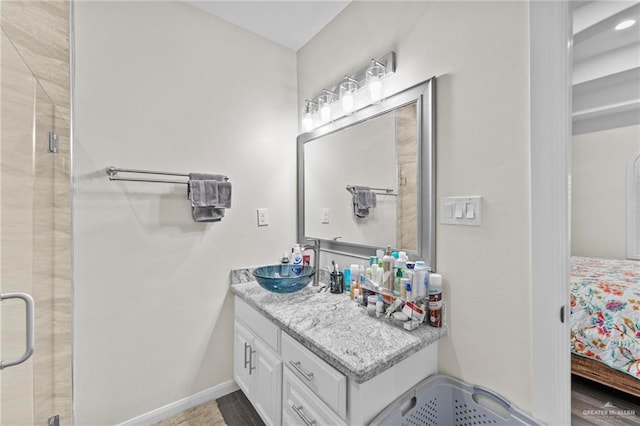 bathroom with vanity and walk in shower