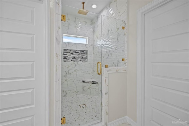 3003 E Palo Blanco St, Hidalgo, TX 78557 - bathroom with a marble finish shower and baseboards