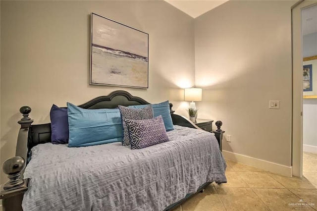 310A Padre Blvd, South Padre Island, TX 78597 - bedroom with light tile patterned floors