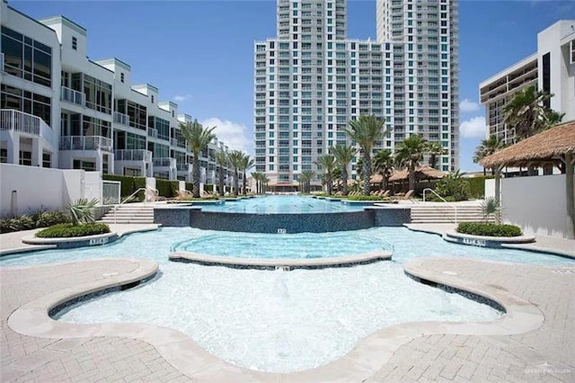 310A Padre Blvd, South Padre Island, TX 78597 - view of swimming pool featuring pool water feature