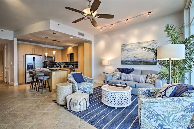 310A Padre Blvd, South Padre Island, TX 78597 - tiled living room with ceiling fan