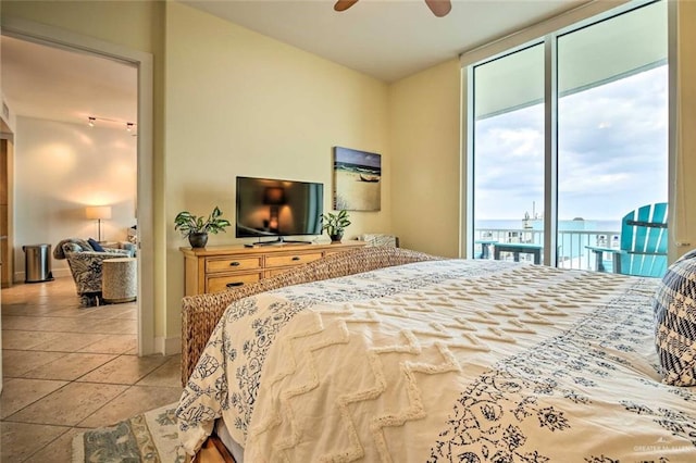 310A Padre Blvd, South Padre Island, TX 78597 - tiled bedroom with access to exterior and ceiling fan