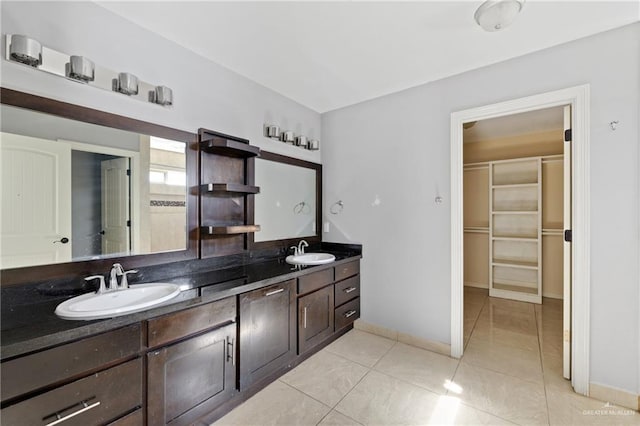 bathroom featuring vanity and tile patterned floors