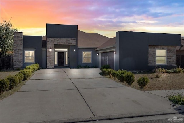 modern home featuring a garage