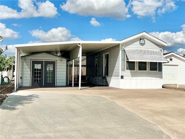 view of front of home with a carport