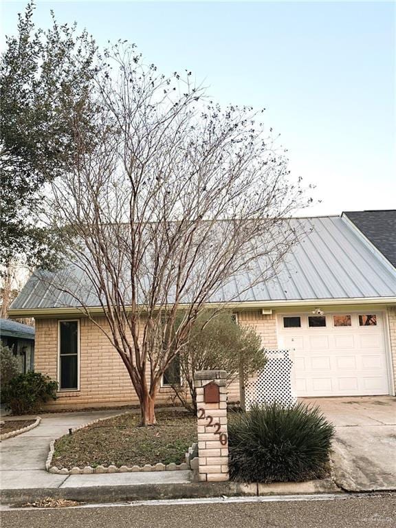 view of front of home with a garage