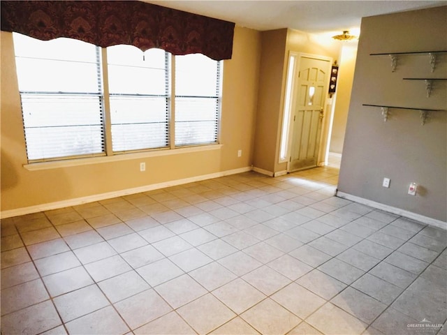 6213 N 17th St, Mcallen, TX 78504 - unfurnished room with light tile patterned flooring and baseboards