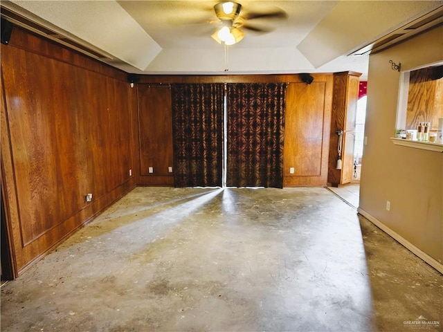 6213 N 17th St, Mcallen, TX 78504 - basement with ceiling fan, wooden walls, and baseboards