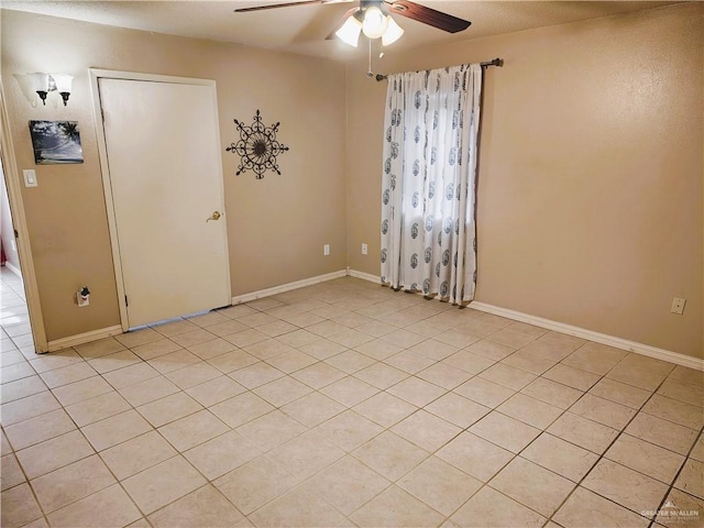 6213 N 17th St, Mcallen, TX 78504 - empty room featuring ceiling fan, light tile patterned floors, and baseboards