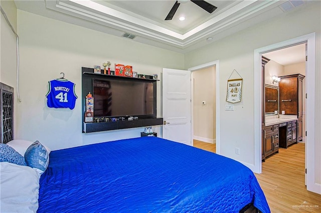4835 Bryan Rd, Palmhurst, TX 78573 - bedroom with a raised ceiling, light wood-type flooring, ceiling fan, and recessed lighting