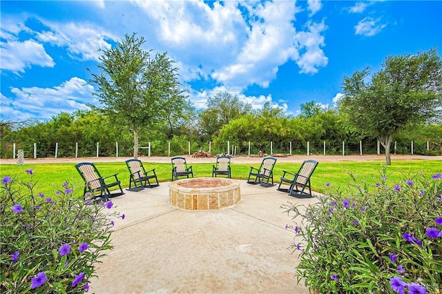 4835 Bryan Rd, Palmhurst, TX 78573 - view of property's community featuring an outdoor fire pit, a lawn, and a patio