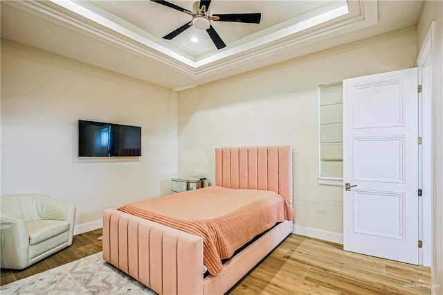 4835 Bryan Rd, Palmhurst, TX 78573 - bedroom with a raised ceiling, light wood-type flooring, recessed lighting, and ceiling fan