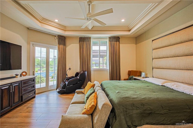 4835 Bryan Rd, Palmhurst, TX 78573 - bedroom with crown molding, multiple windows, access to exterior, light wood finished floors, and a raised ceiling