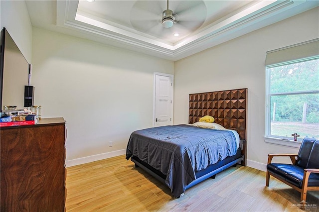 4835 Bryan Rd, Palmhurst, TX 78573 - bedroom with a tray ceiling, light wood-type flooring, recessed lighting, and a ceiling fan