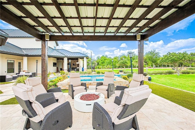 4835 Bryan Rd, Palmhurst, TX 78573 - view of patio featuring an outdoor living space with a fire pit and an outdoor pool
