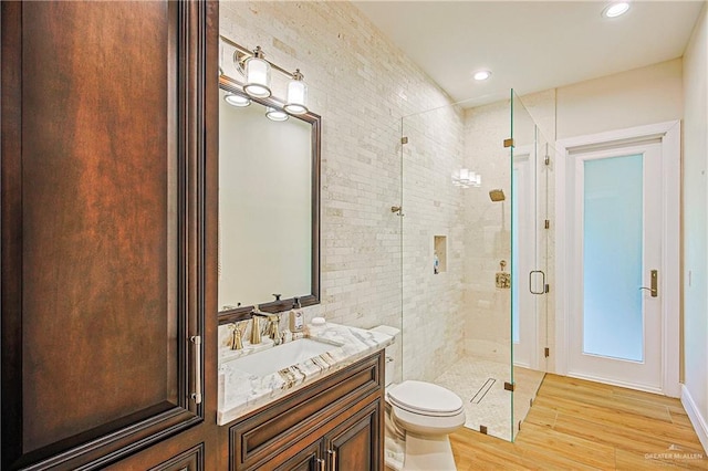 4835 Bryan Rd, Palmhurst, TX 78573 - full bath featuring a shower stall, wood finished floors, vanity, and recessed lighting