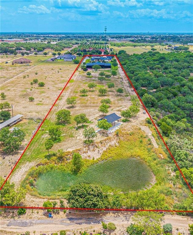 4835 Bryan Rd, Palmhurst, TX 78573 - aerial view of sparsely populated area featuring property parcel outlined
