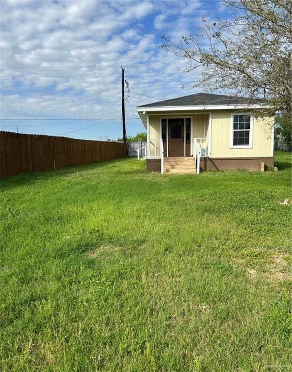 view of outdoor structure with fence